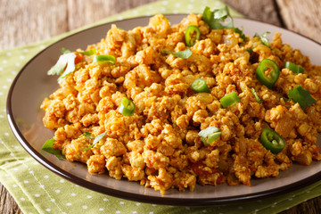 Chicken Keema minced chicken sauteed in onion, tomatoes and flavored with aromatic Indian spices closeup. Horizontal