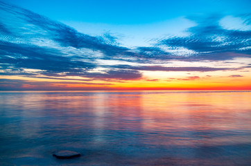 Tranquil sunrise over shot using long exposure