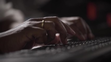 Female employee typing on computer keyboard.