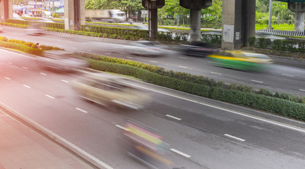 Blurry of speeding cars