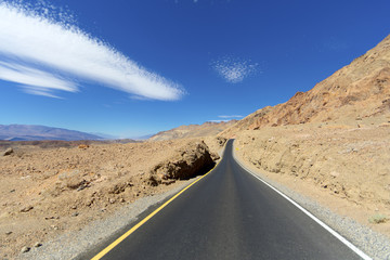 The winding one-way road to Artist’s Palette in Death Valley dips through the terrain.