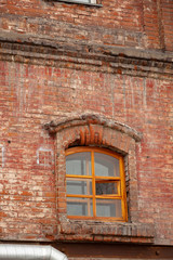 Fototapeta na wymiar Old brick buildings, wall and windows