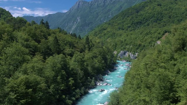 Aerial - Panoramic view of Soča river running through the mountain valley