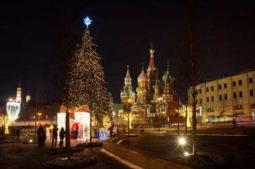Fototapeta na wymiar Moscow, Russia - January 10, 2018: Christmas tree in the square near Zaryadye landscape Park on a winter evening. Varvarka street