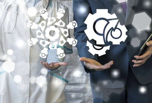 Doctor gives a doctor working group logo and businessman represents a gear mechanism icon on a virtual interface. Meeting, Quality Cooperation, Teamwork, Healthcare Business Collaboration. Conference.