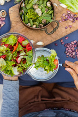 Fresh juicy summer salad, vegan vegetarian food, healthy paleo diet. Tomatoes, salad leaves