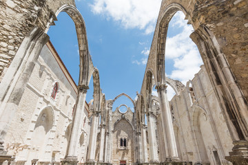 Ruins of the Gothic Church of Our Lady of Mount Carmel (Igreja do Carmo), destroyed by an earthquake in 1755,  Lisbon, Portugal - obrazy, fototapety, plakaty