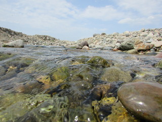 Naklejka na ściany i meble stones in the water background