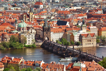 Fototapeta na wymiar Aerial view to Prague historic center with Charles Bridge in the middle