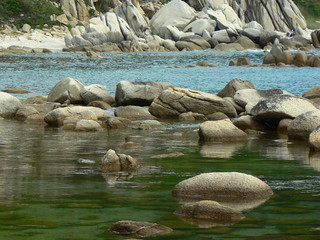 stones in a calm bay on the coast of the Japanese Sea