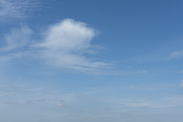 Dramatic blue sky with fluffy clouds texture background.
