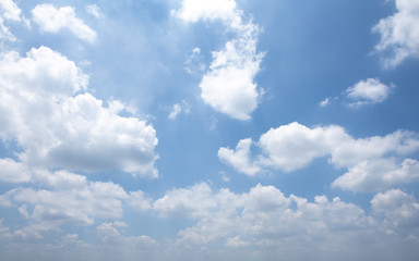 Fototapeta na wymiar Dramatic blue sky with fluffy clouds texture background.