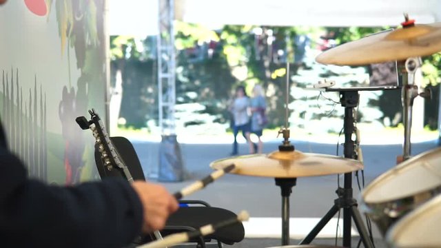 Drumer in action, drummer playing on drum set
