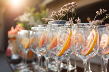 Empty wineglasses with decorating on corporate event