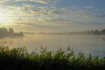 Obraz na płótnie Canvas Morning Fog over Dutch Lake