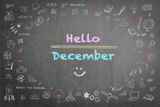 Hello December greeting on school black chalkboard background with doodle