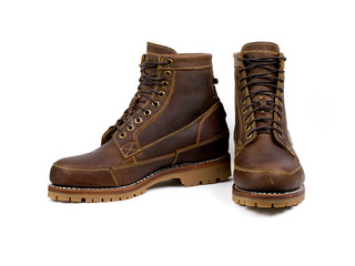 Men's brown boots isolated on a white background.