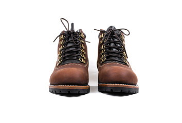 Men's brown boots isolated on a white background.