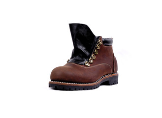 Men's brown boot isolated on a white background. Top view