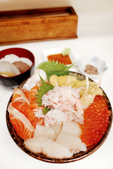 Big Bowl Fresh Raw Seafood, Salmon, Scallop, Urchin, Crab with Rice Serve with Scallop Soup at Fish Market   