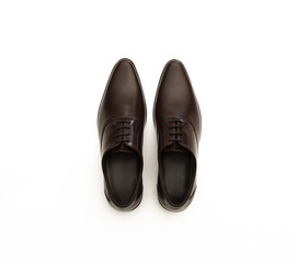 Men’s dress shoes isolated on white background. top view