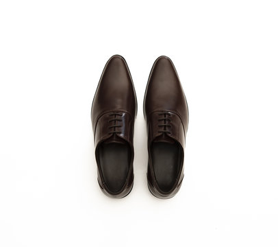 Men&rsquo;s dress shoes isolated on white background. top view