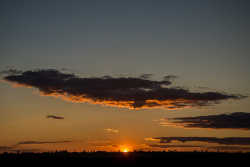 Naklejka premium evening clouds in the sunset glow