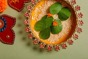 Happy Dussehra greeting card , green leaf and rice