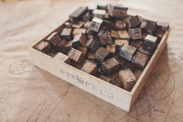 Alphabet rubber stamps in wooden box