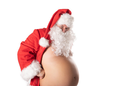 Funny fat man with big belly in Santa costume.