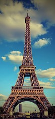 Fototapeta premium Eiffel Tower and the blue sky with vintage effect