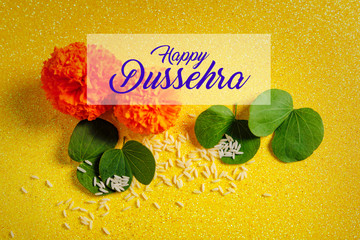 Happy Dussehra greeting card , green leaf and rice