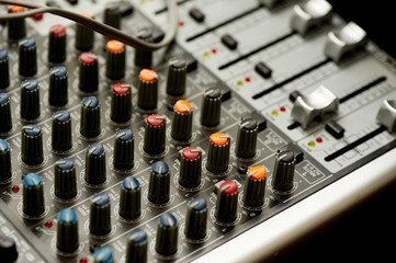 The details of your DJ controller, close. Macro in the dark, with lights. Nightlife
