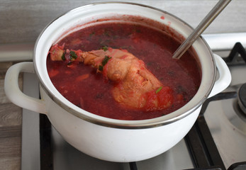 Saucepan with soup on the stove.