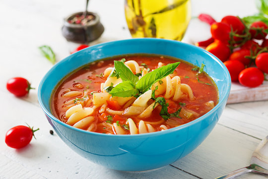 Minestrone, italian vegetable soup with pasta. Tomatoes soup. Vegan food.