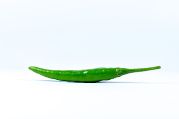 Hot red chili or chilli pepper on white background.