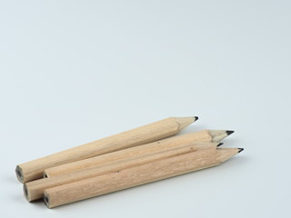 Wood pencil on white background.