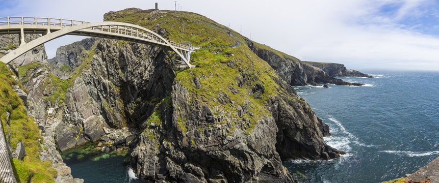 Panoramic picture of pedastrian bridge to Mizen Head lighthouse in south Ireland