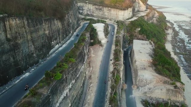 aerial view of curve road on Melasti cliff