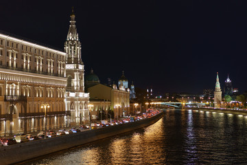 Naklejka premium City image at the autumn night: Moskva river, Kremlin and Cathedral of Christ the Saviour