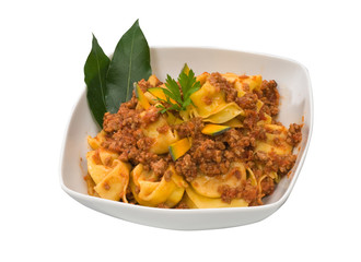 Tortelloni di zucca in tazza bianca