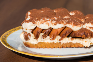 Traditional italian dessert tiramisu on a table