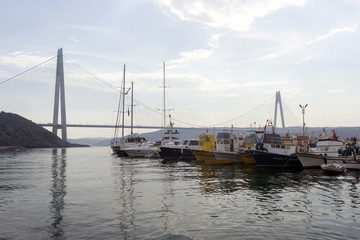 Fototapeta premium Boats, fishing boats, yachts and motor boats in a bay in Istanbul, Turkey
