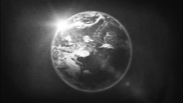 Earth Planet On Retro Black And White Tv Filter/
Animation of a realistic old black and white tv texture filter with earth planet surface rotating