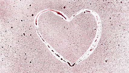 Stop motion animation - heart drawn on dewy surface