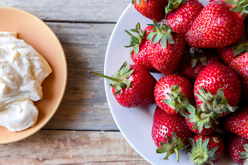 fresh juicy red strawberry with whipped cream