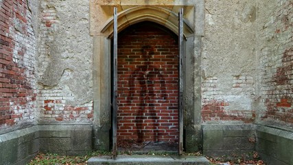 Stop motion animation - mysterious figure in the open old gate