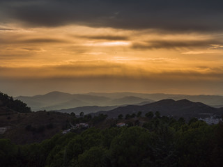 A stormy sunset over the hills of Andalusia Spain