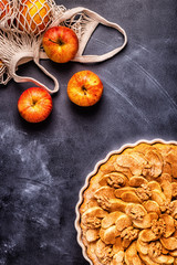 Fototapeta premium Apple pie with walnuts and cinnamon.
