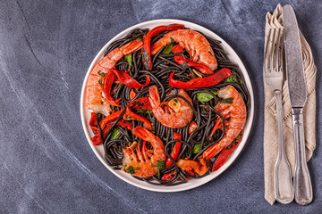 Black spaghetti with prawns and vegetables